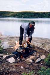 Cooking along shore.